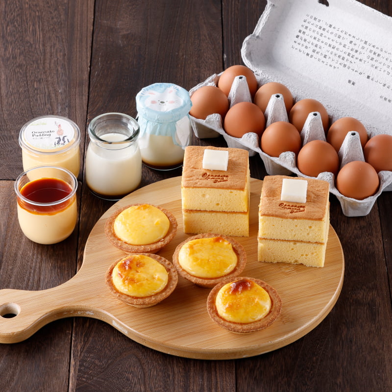 食べ比べできる大江ノ郷ぷりんといなばの白ぷりんに、定番人気のパンケーキのケーキや大江ノ郷タルトを詰め合わせ。朝採れ新鮮な天美卵と一緒にお届けします。