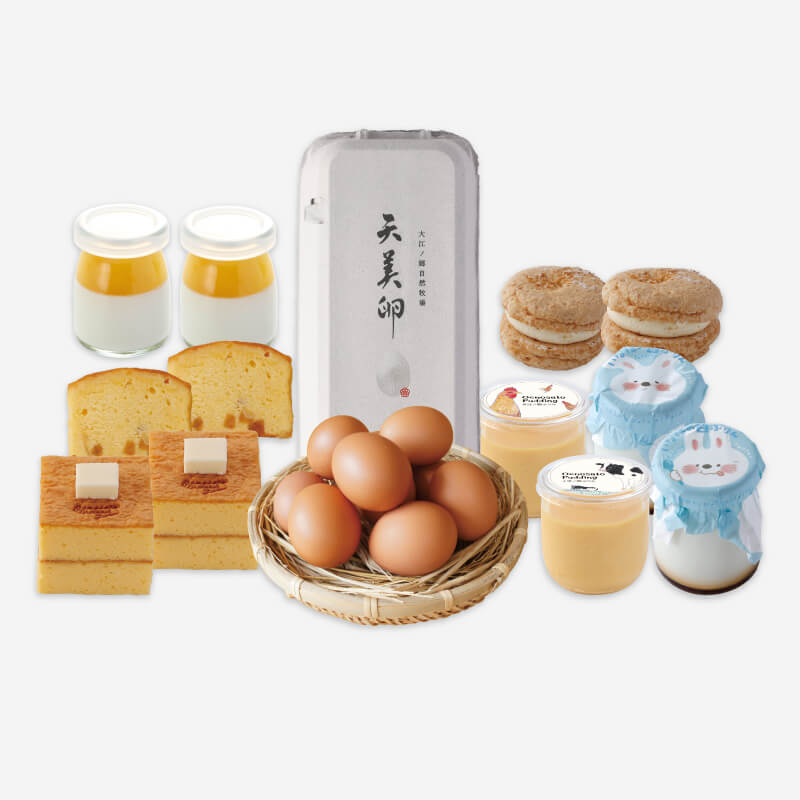 夏限定の柑橘ぷりんやトロピカルダックワーズをはじめ、人気のぷりんや焼き菓子、牧場自慢の天美卵を詰め合わせ。