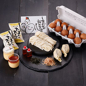 朝採れ新鮮な天美卵、釜玉うどん、たまごスープ、大江ノ郷ぷりんを詰め合わせた牧場人気のセット。オリジナルデザインのしあわせカード付きでギフトにもおすすめです。
